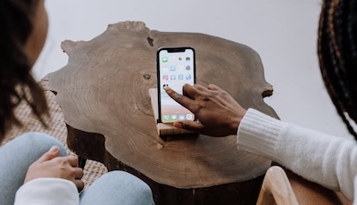 Image of an iPhone locating the owner's friends.